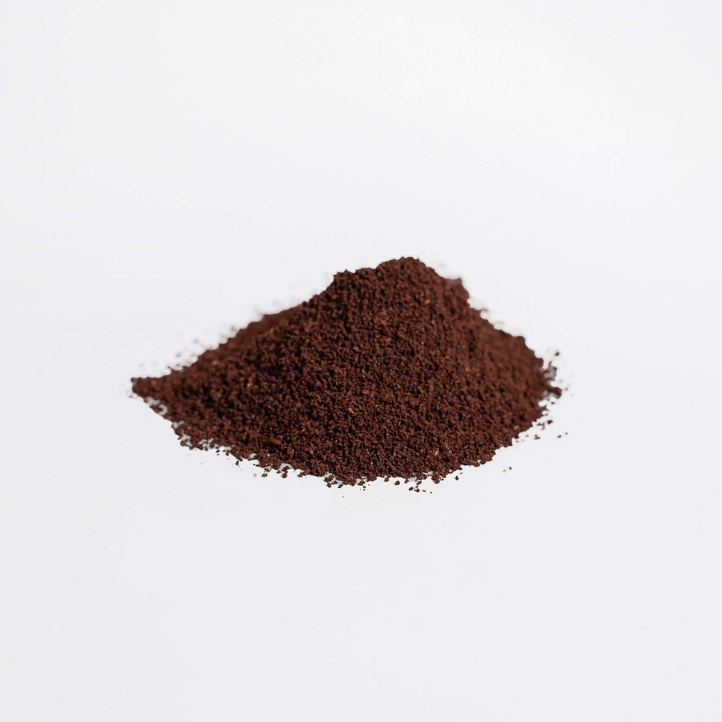 Freshly ground coffee powder from Ti.co, perfect for brewing your favorite coffee or tea.